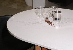 a table with coffee beans and cups on it