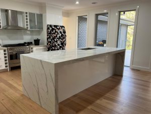 a kitchen with a large island