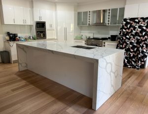 a kitchen with a large island