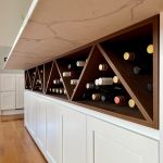 a wine bottles in a shelf