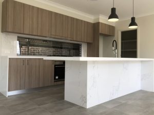 a kitchen with a white countertop