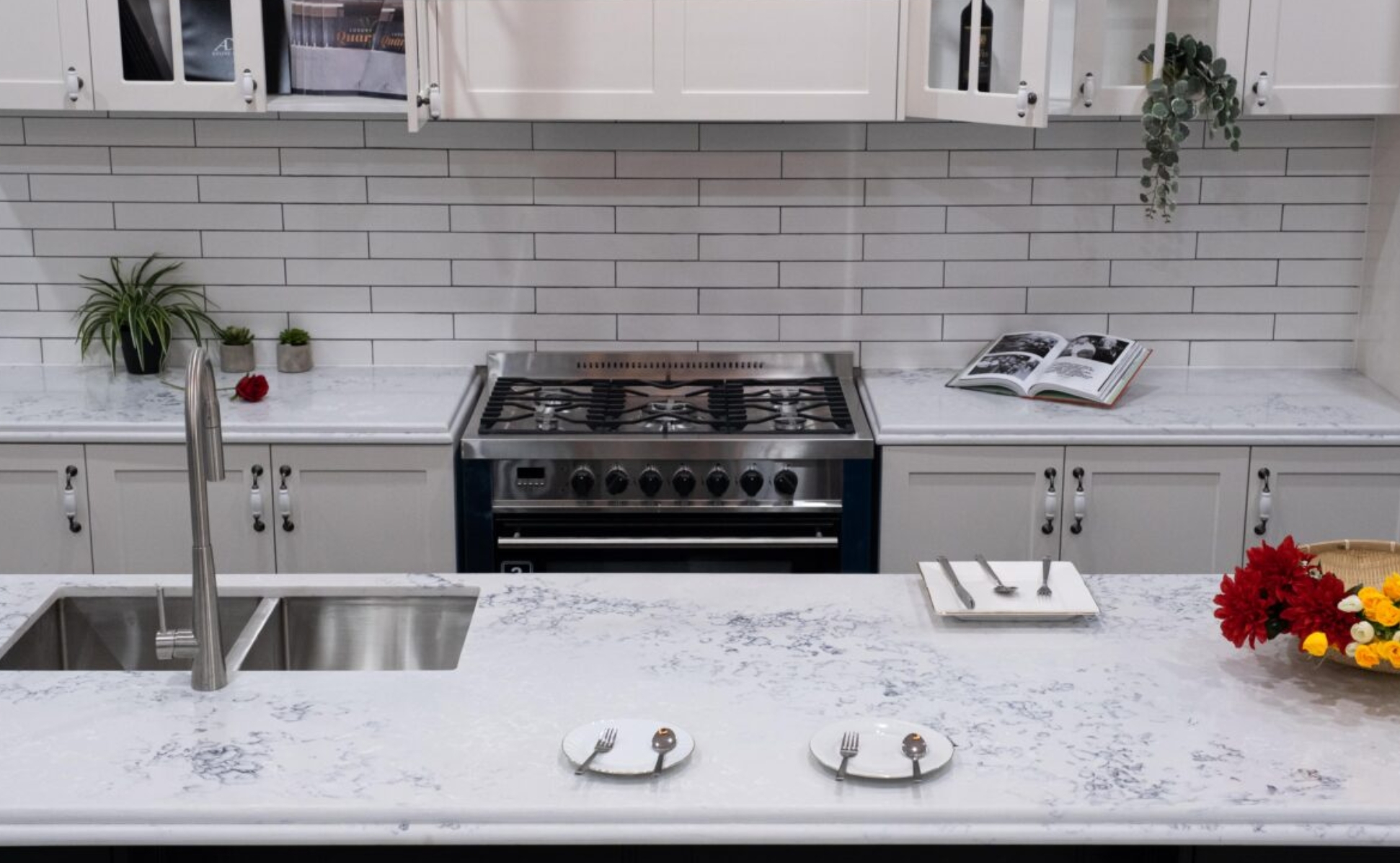 Snowy Mountain (AC8000)4 a kitchen with white cabinets and white countertops