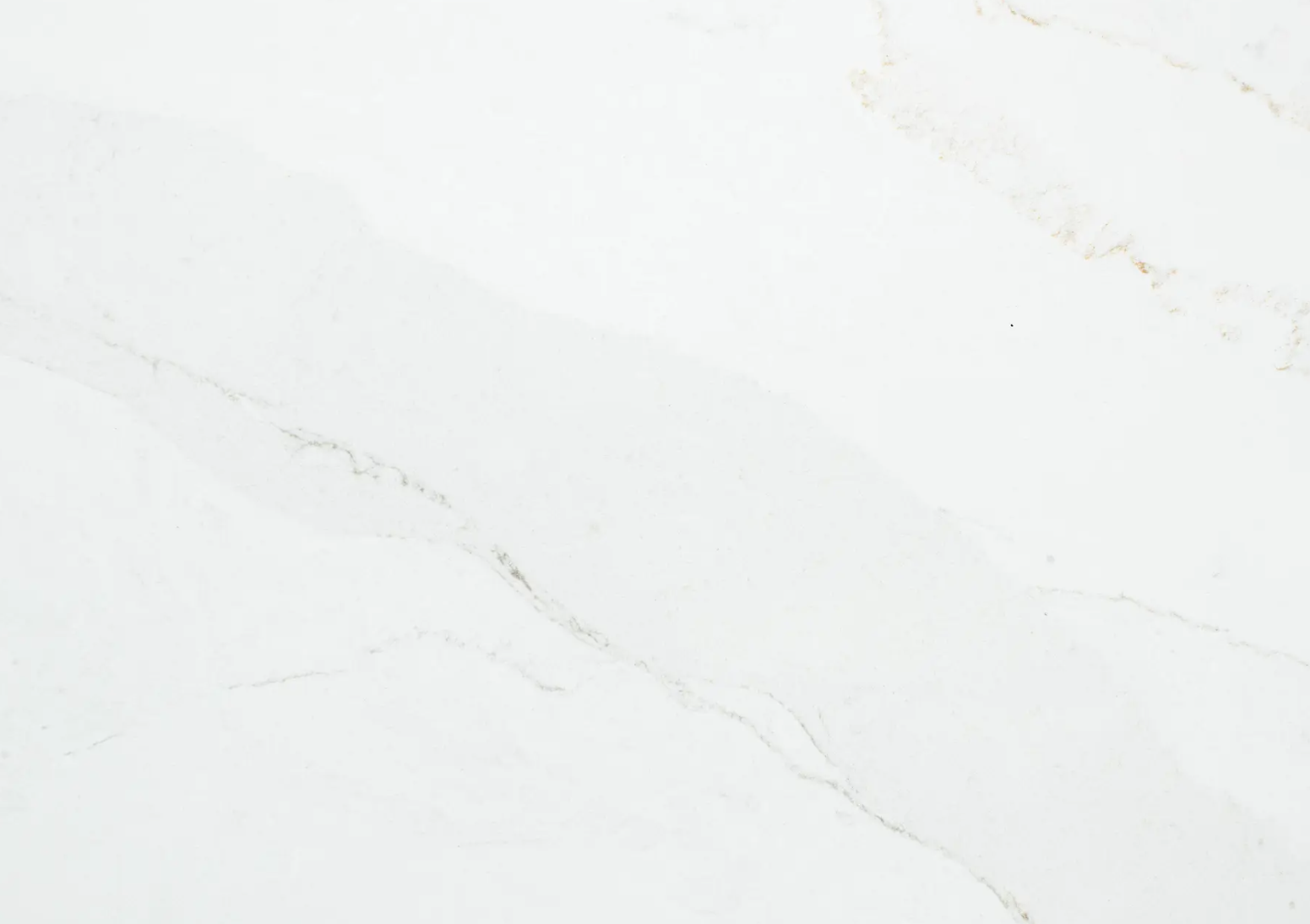 1605 Inara1 Vicostone Inara 1605 quartz slab white surface with dynamic Calacatta-style veins close-up