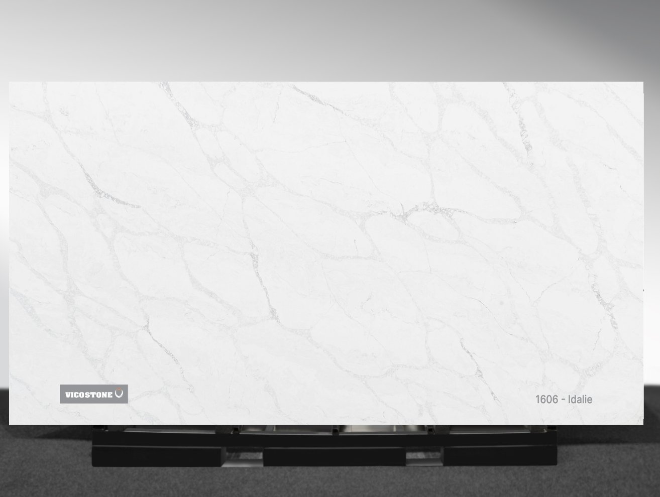 1606 Idalie Vicostone Idalie 1606 quartz slab white-gray surface with full-bodied veining close-up