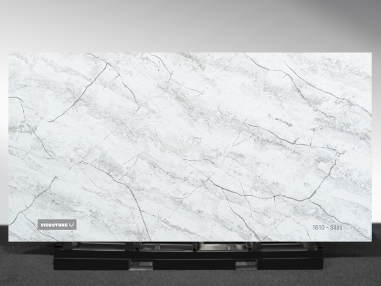 Vicostone Silas 1610 quartz slab dramatic white and gray surface with dynamic veins close-up