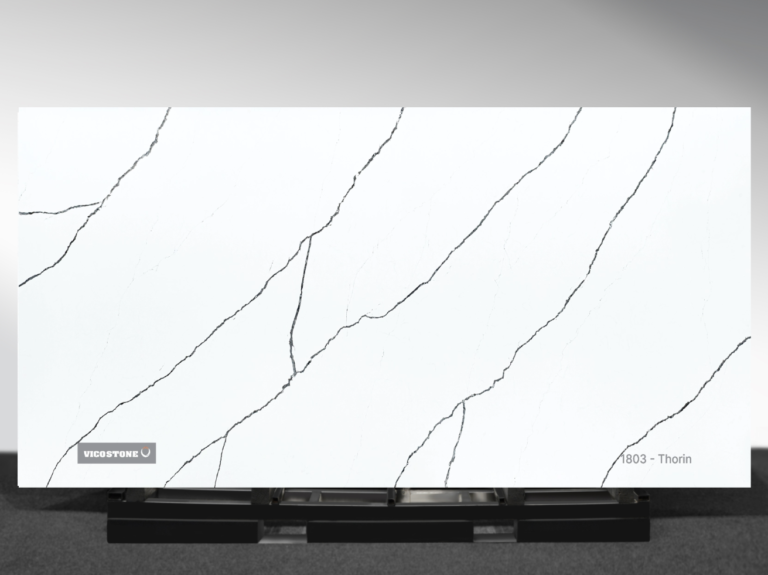 Vicostone Thorin 1803 quartz slab white surface with striking gray-black veins close-up