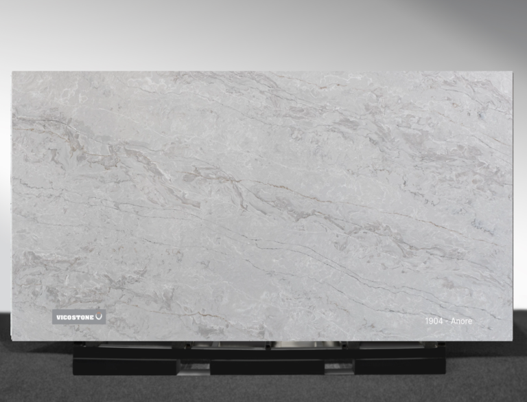 Vicostone Anore 1904 quartz slab warm earthy surface with flowing patterns close-up