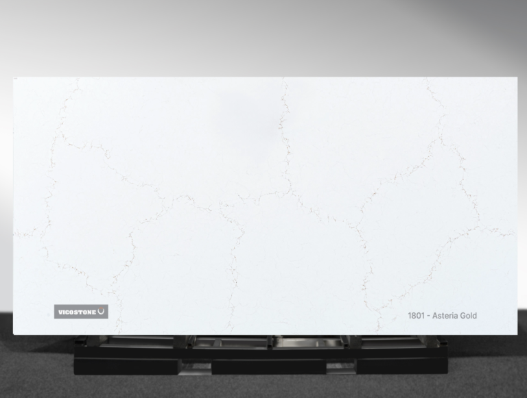 Vicostone Asteria Gold 1801 quartz slab white surface with soft silvery veins close-up