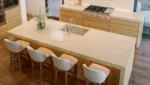 Canyon Choir Vadara® Quartz engineered stone slab with light beige and soft grey background and earth-toned veining