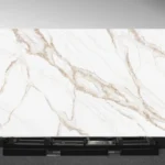 Desert Blush Vadara® Quartz engineered stone slab with white base and rust‑colored veining