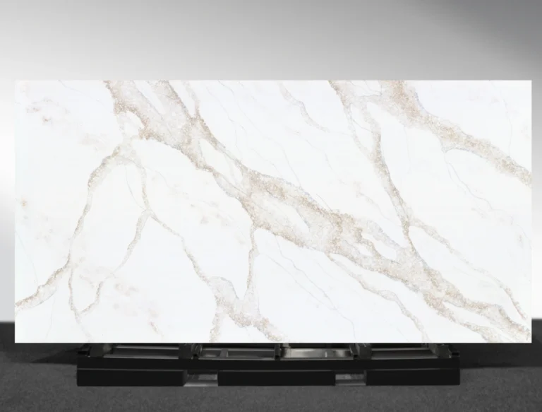 Golden Scribe Vadara® Quartz engineered stone slab with bright white background and tan and blue-grey veining
