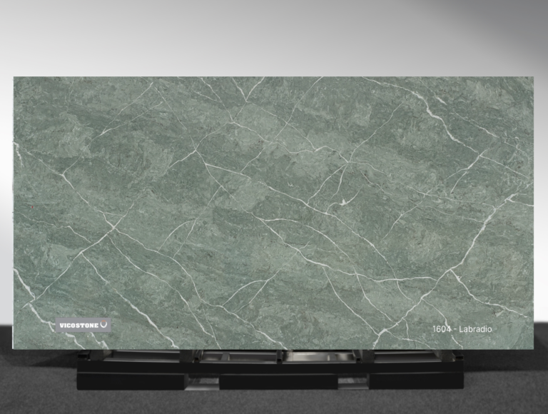 Vicostone Labradio 1604 quartz slab green-gray surface with tree-like white veins close-up