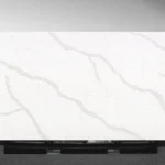 Close‑up of Lakestone Vadara® Quartz highlighting dynamic grey and rust veins