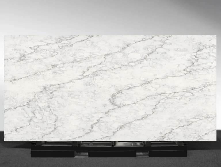 Monteserro Vadara® Quartz engineered stone slab with warm earth-tone background and deep brown and taupe veining