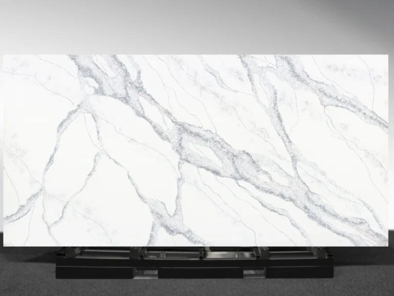 Scandi Blue Vadara® Quartz engineered stone slab with white background and bold blue, bronze, rust veining