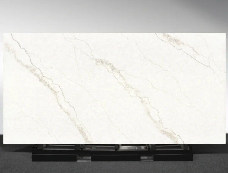 Sinterra Vadara® Quartz engineered stone slab with off‑white and soft grey base and muted gold veining