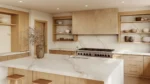 Bathroom vanity with Sinterra quartz showing elegant muted gold veins on a light background