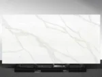 Verdant Rise Vadara® Quartz engineered stone slab with white background and light grey, gold, green veining