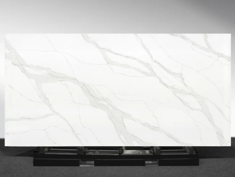 Verdant Rise Vadara® Quartz engineered stone slab with white background and light grey, gold, green veining
