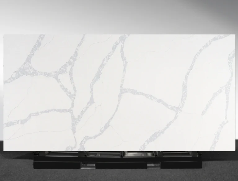 CSF1026 features a pure white base with soft, flowing grey veining that spreads naturally across the slab.