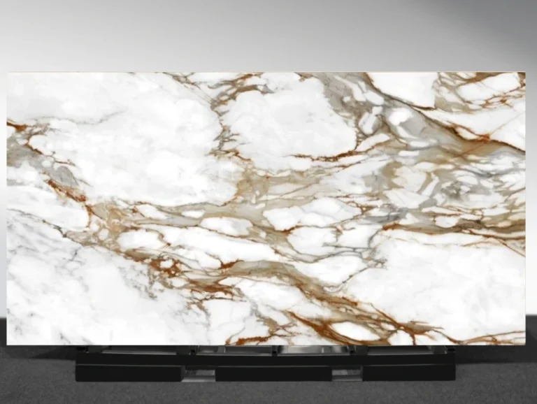 Essential Gold Asetica sintered stone slab with white base and bold gold veining inspired by Calacatta Oro, supplied by AUSKstone Sydney.