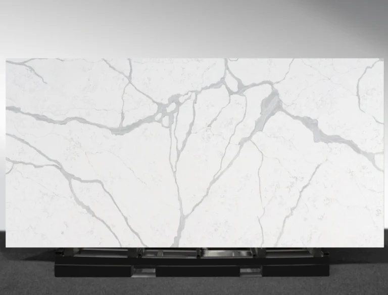 Rivuline features a soft white base with branching grey veins that spread across the slab in a natural, interconnected pattern.