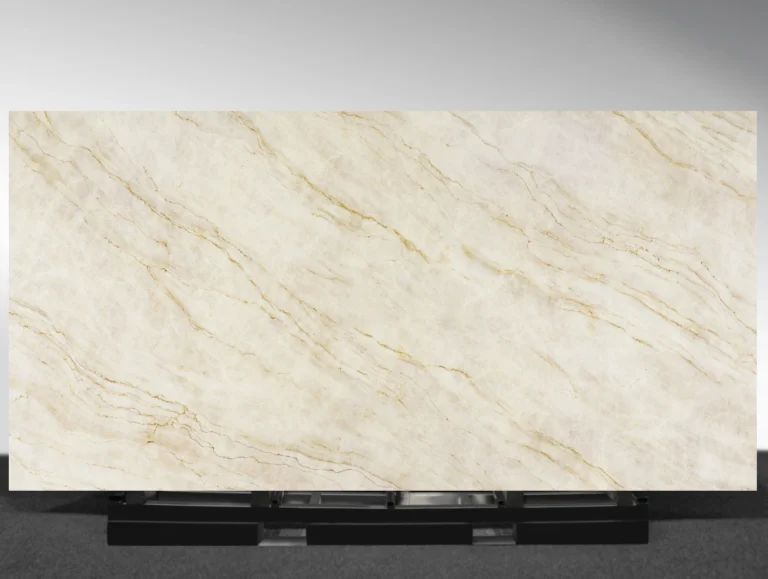 Sahara Champagne features a warm beige base with long, flowing veins in soft gold and taupe.