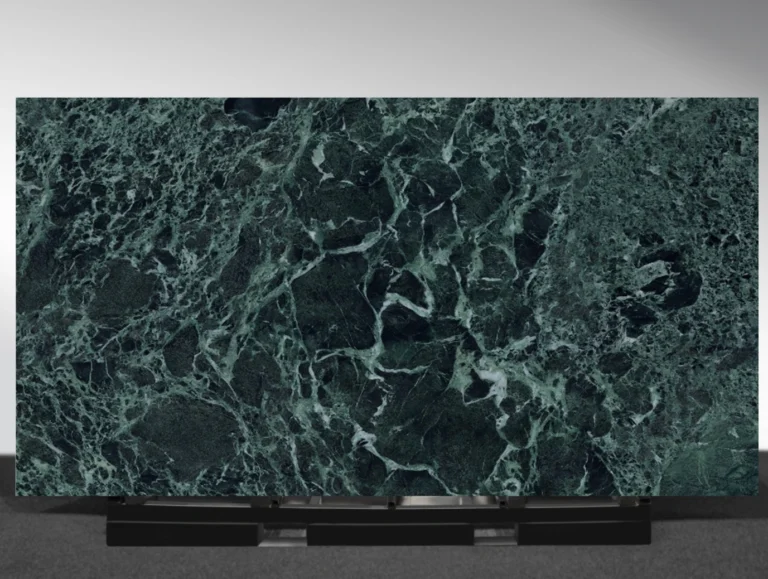 Verde Alpi green marble sintered stone white veining surface close up